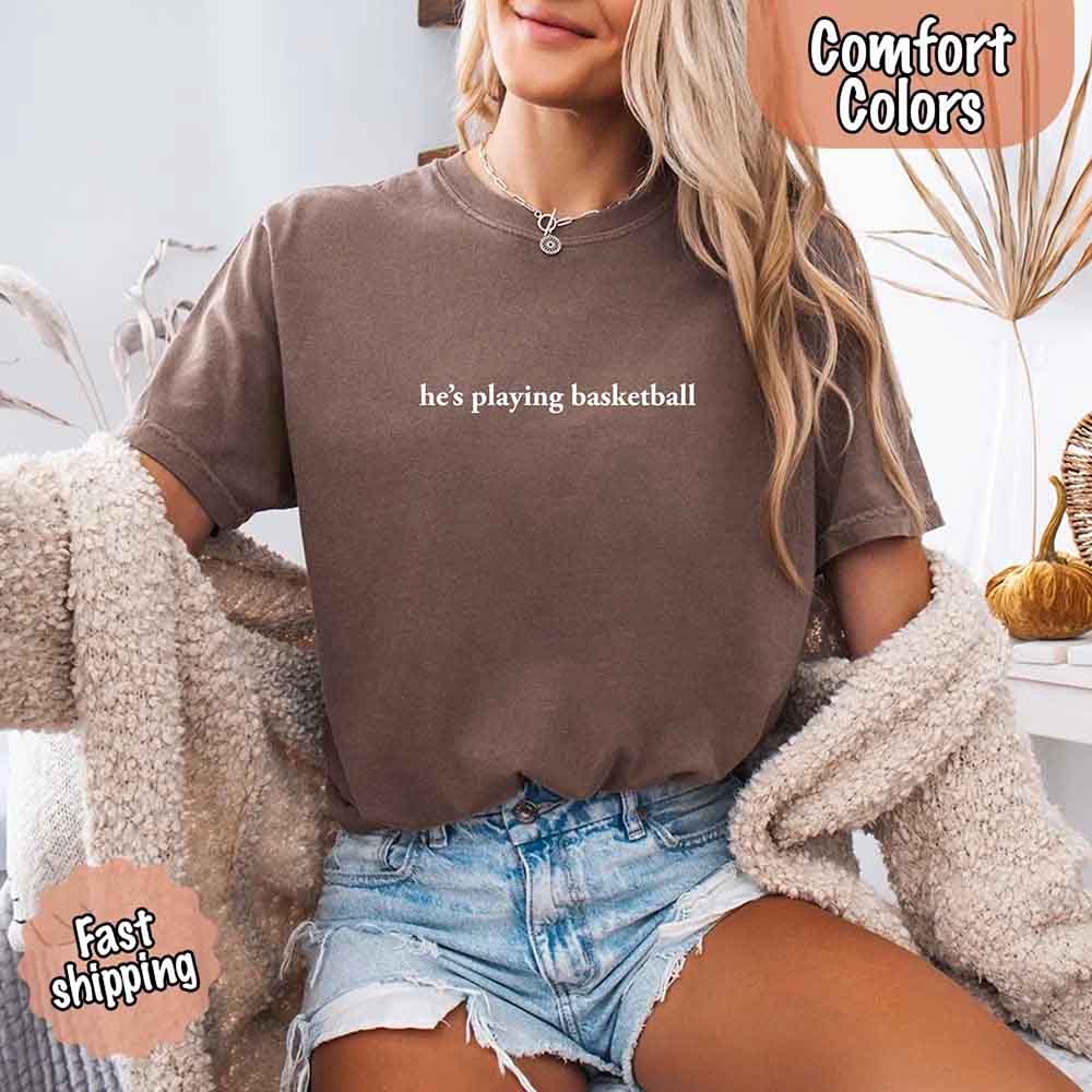 He’s Playing Basketball – Funny Sports Girlfriend Comfort Color Shirt for Women