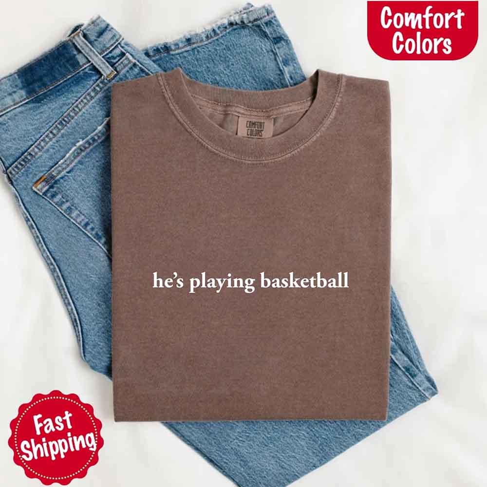 He’s Playing Basketball – Funny Sports Girlfriend Comfort Color Shirt for Women