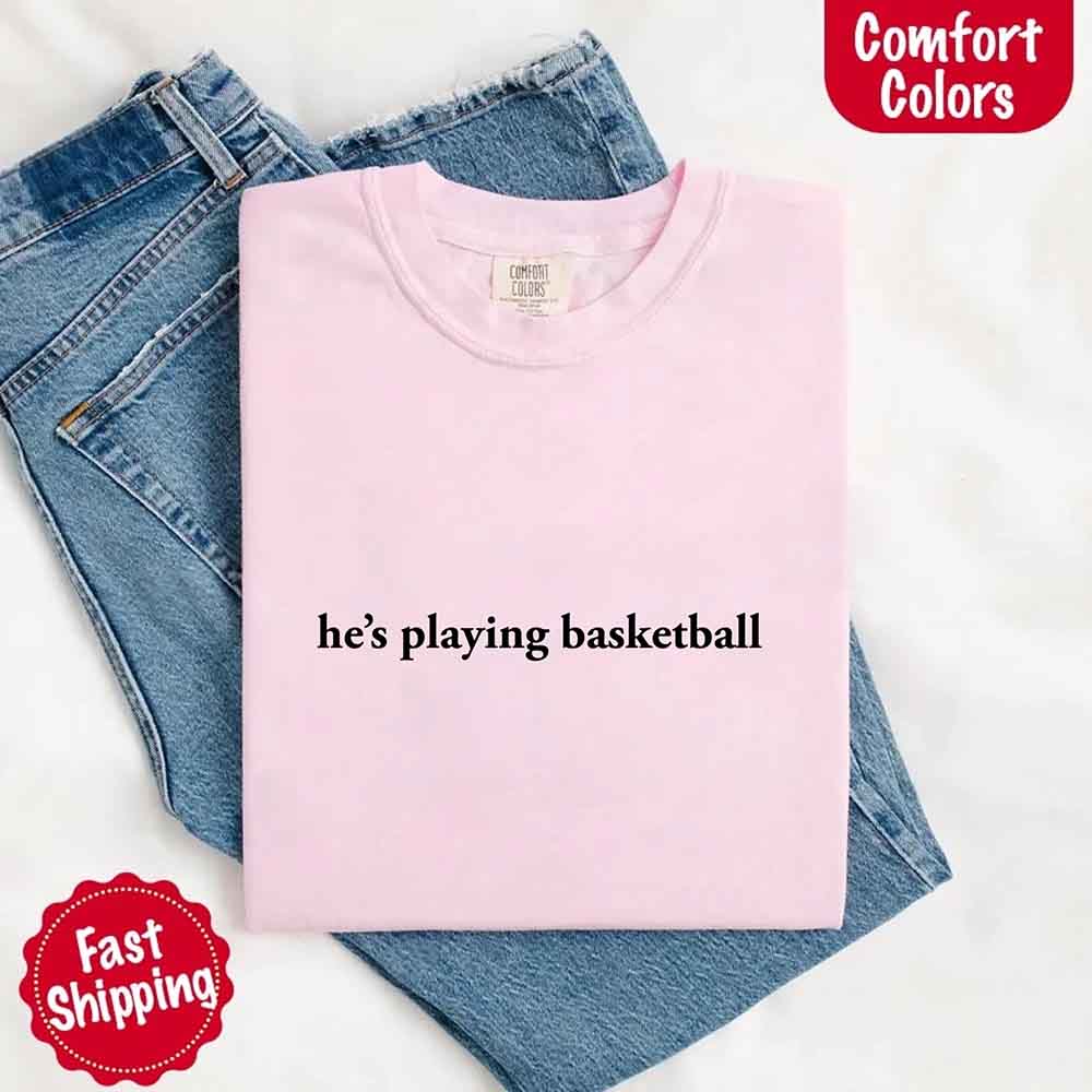 He’s Playing Basketball – Funny Sports Girlfriend Comfort Color Shirt for Women